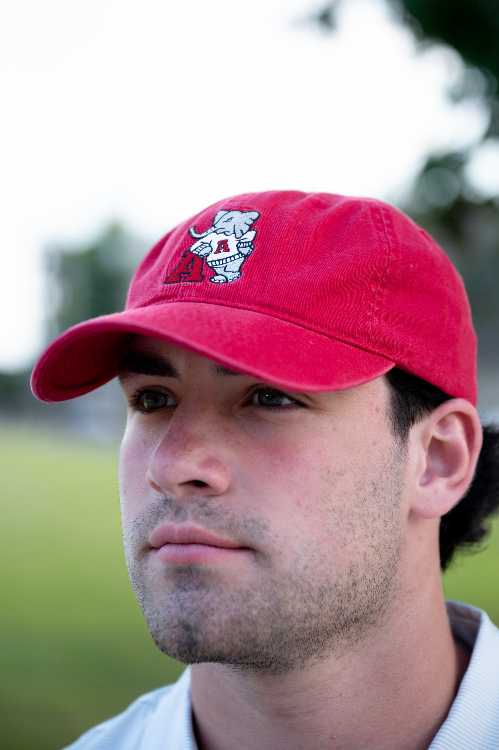University of Alabama Red Dad Hat with an embroidered Big Al leaning on a Red Block A