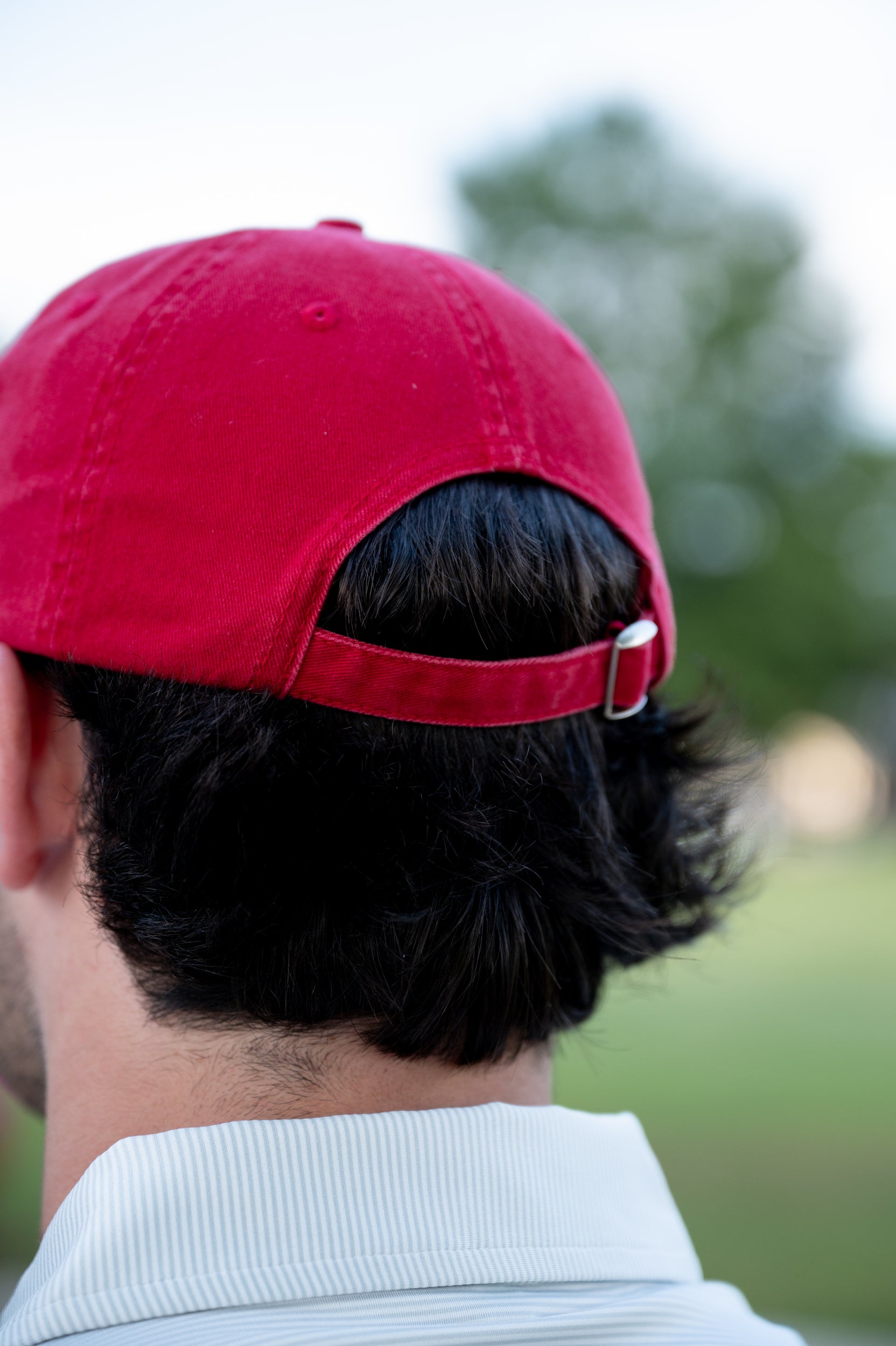 University of Alabama Red Dad Hat with an embroidered Big Al leaning on a Red Block A