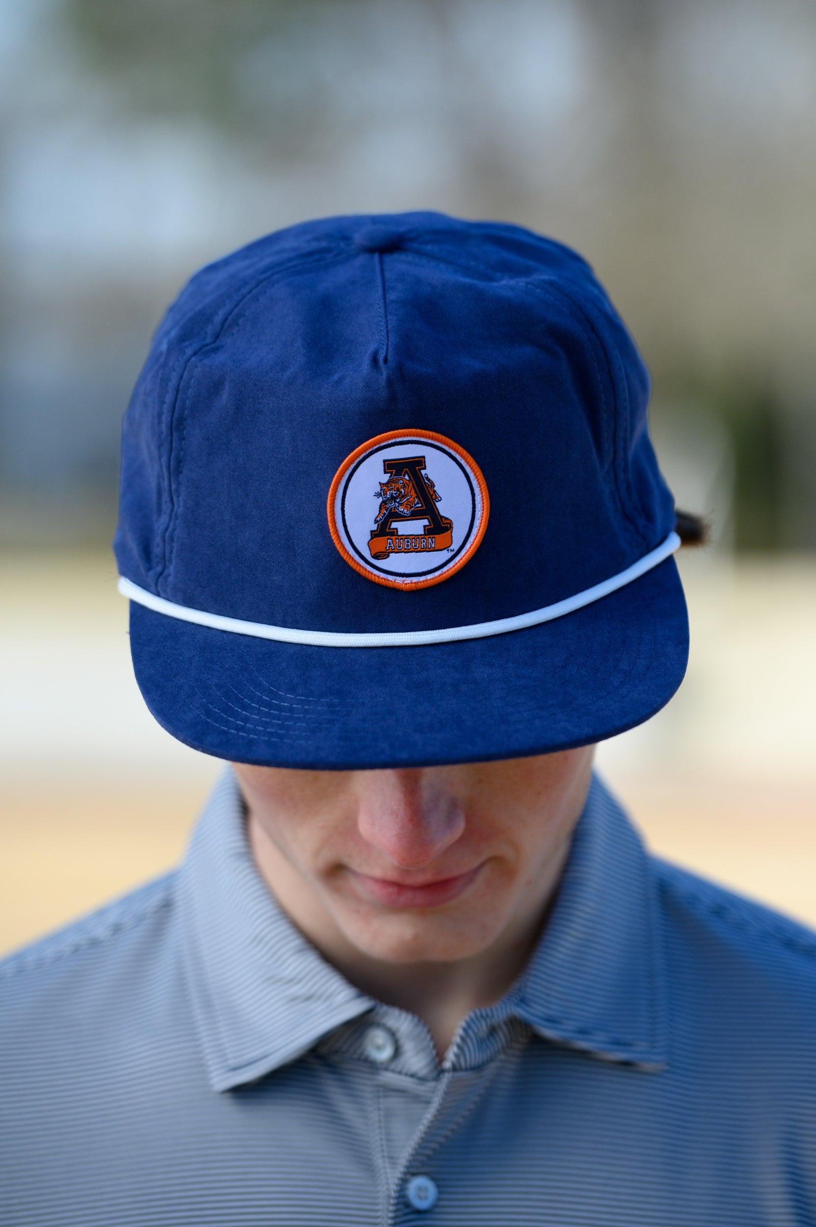 Auburn University Navy Hat with a White rope and a patch of the Leaping Tiger Logo