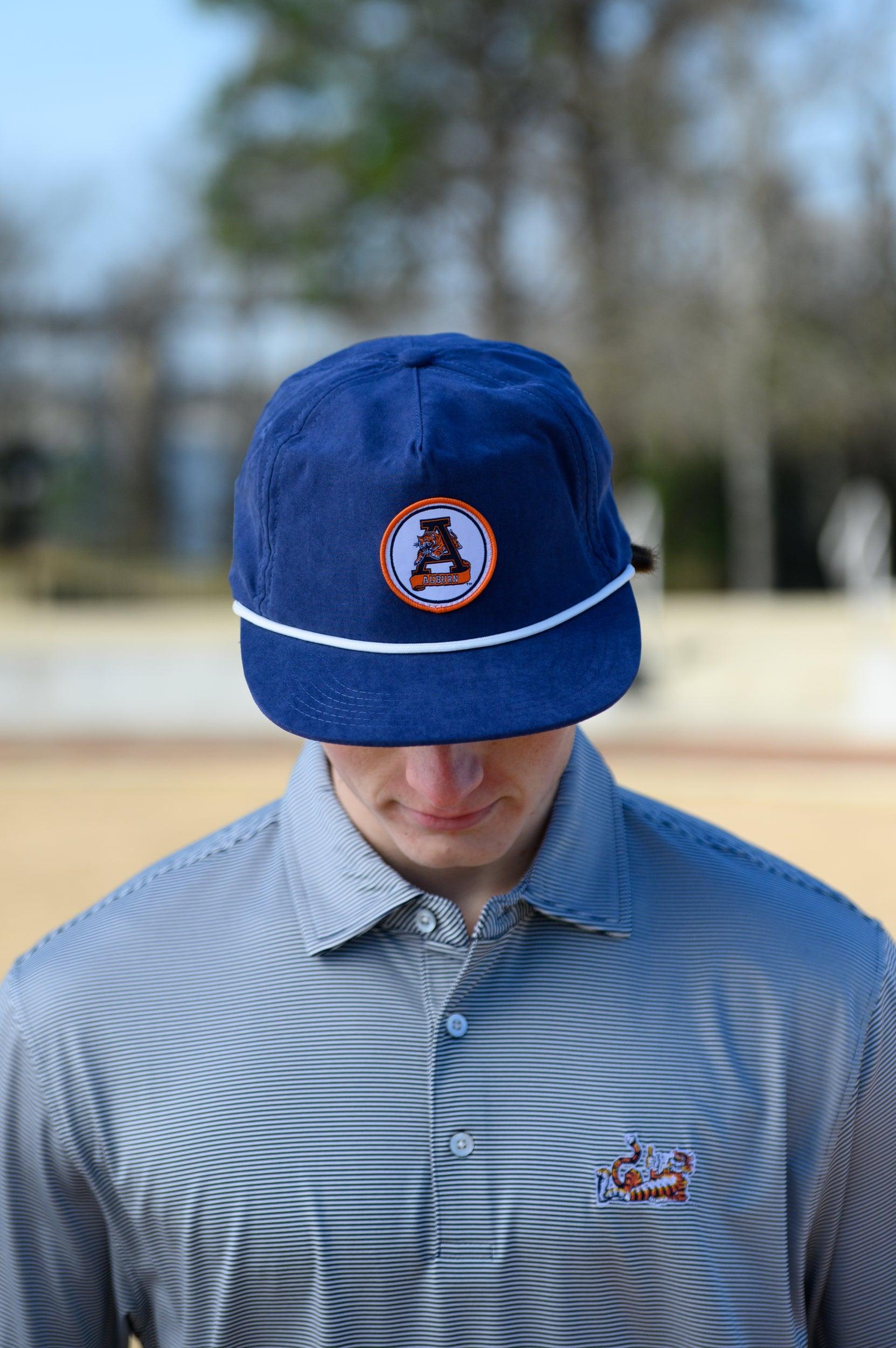 Auburn University Navy Hat with a White rope and a patch of the Leaping Tiger Logo