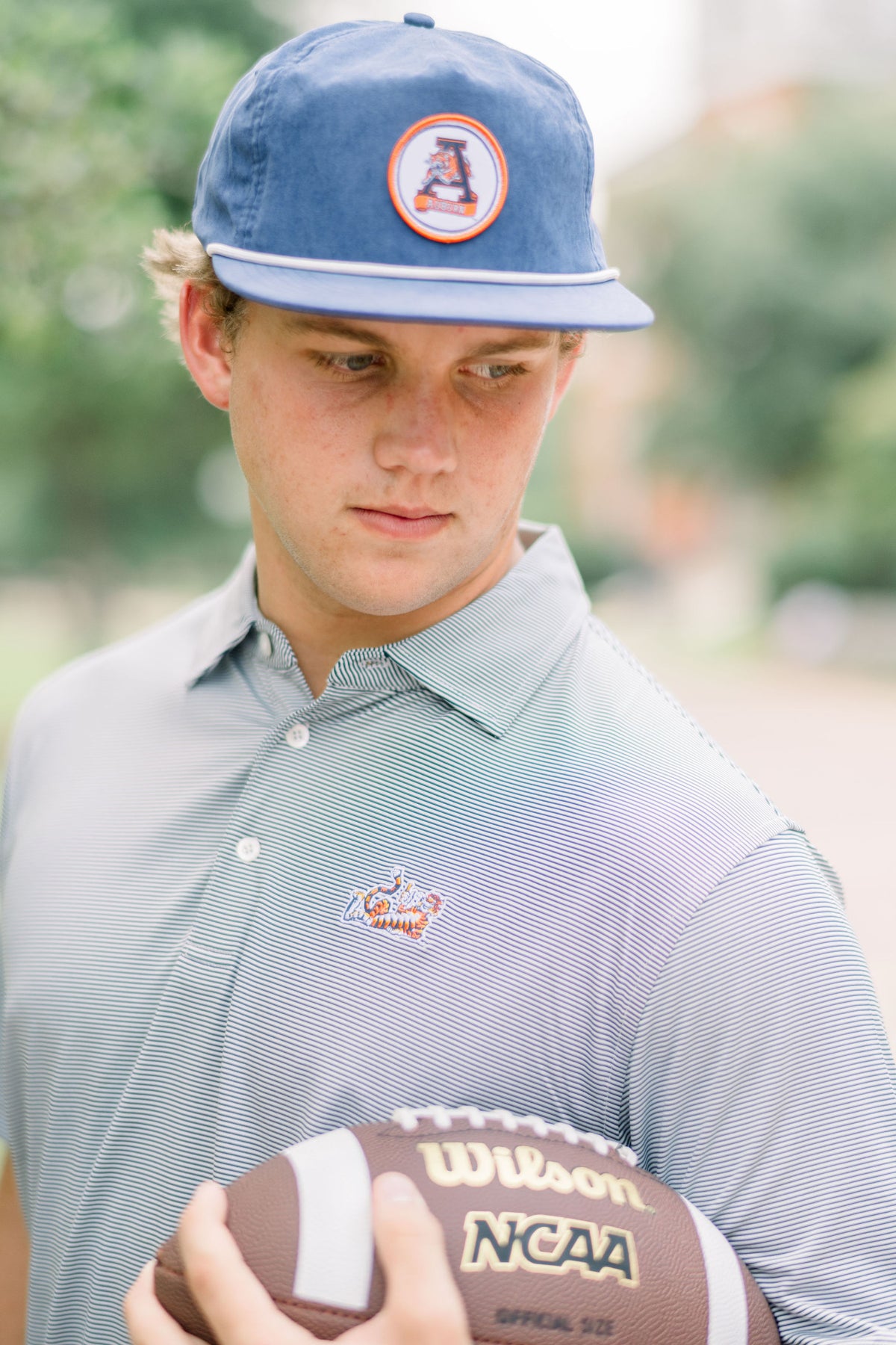 Auburn University Navy Hat with a White rope and a patch of the Leaping Tiger Logo