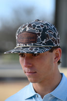 Ole Miss Camo Hat with a Leather patch with text “Mississippi University”