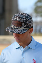 Ole Miss Camo Hat with a Leather patch with text “Mississippi University”