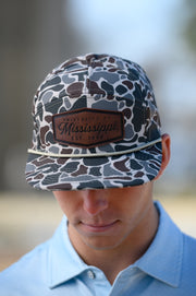Ole Miss Camo Hat with a Leather patch with text “Mississippi University”