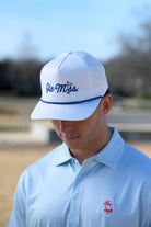 Ole Miss White Hat with Blue embroidery “Ole Miss” with a golf flag representing the “I” in “Miss”