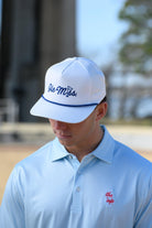 Ole Miss White Hat with Blue embroidery “Ole Miss” with a golf flag representing the “I” in “Miss”
