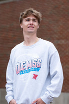 Ole Miss Light Grey Heather Sweatshirt with a basketball hoop outline behind text “Ole Miss Basketball”