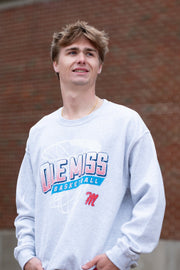Ole Miss Light Grey Heather Sweatshirt with a basketball hoop outline behind text “Ole Miss Basketball”
