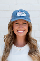 Ole Miss Dusty Blue Hat with a fishing lure with Red script “Rebels”