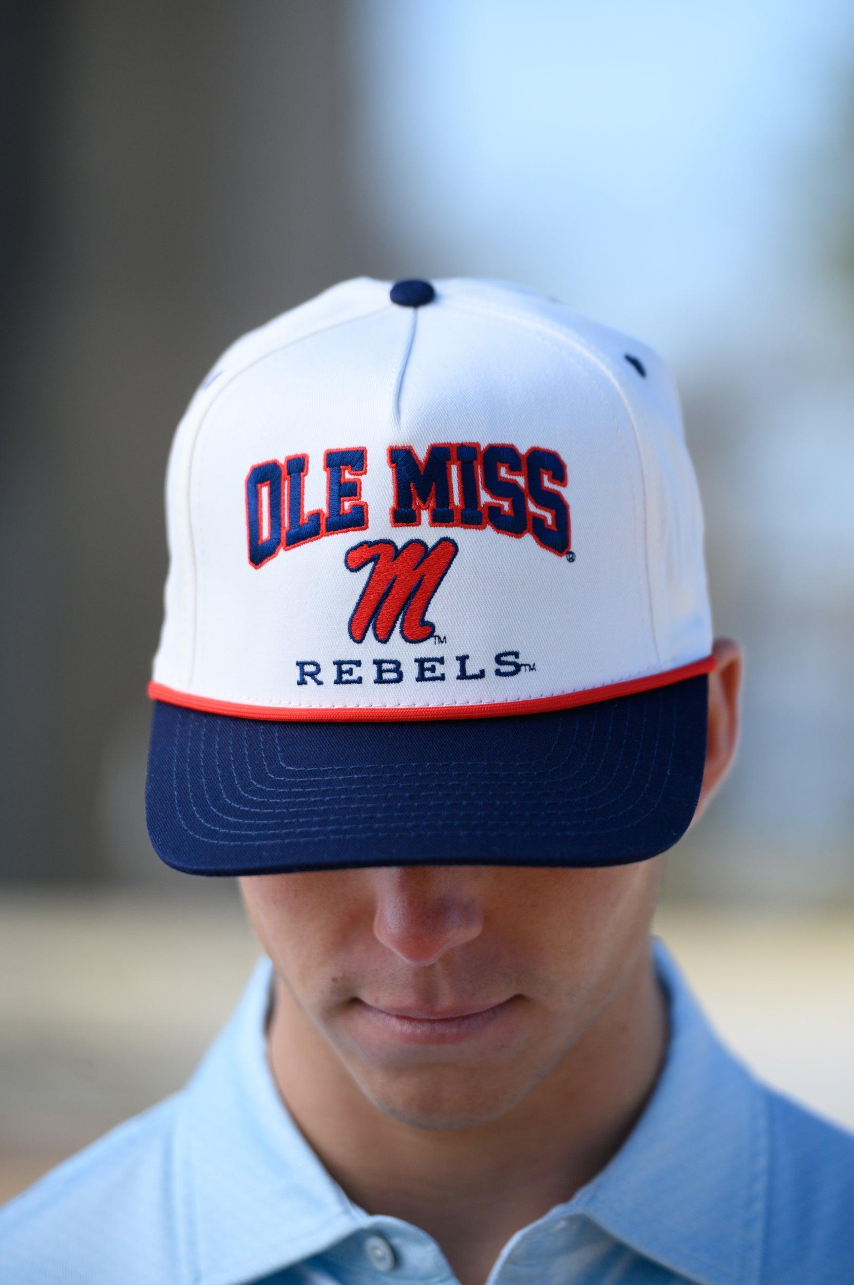 Ole Miss Cream and Navy Hat with embroidered text “Ole Miss Rebels” surrounding the Script M Logo