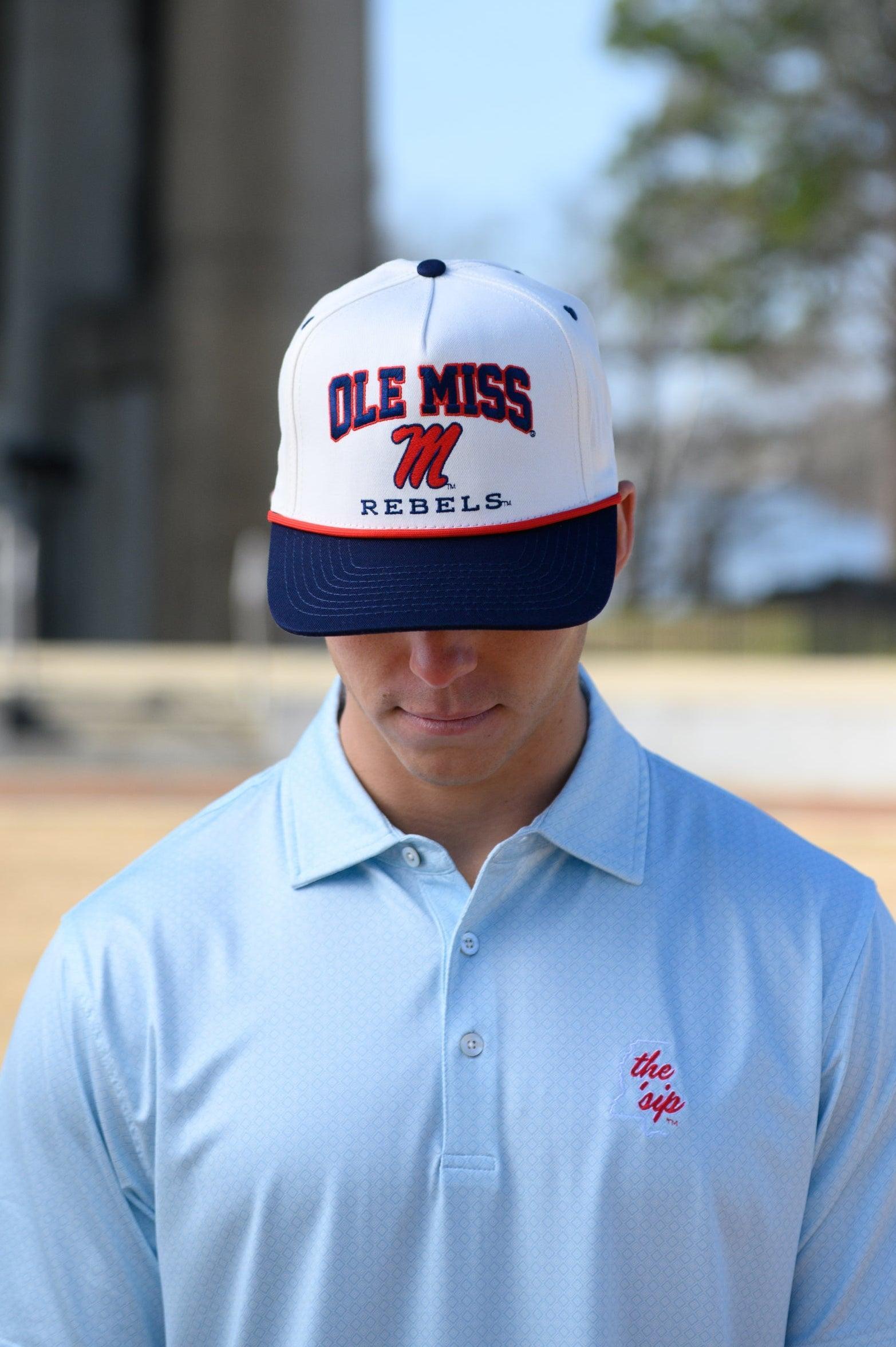 Ole Miss Cream and Navy Hat with embroidered text “Ole Miss Rebels” surrounding the Script M Logo