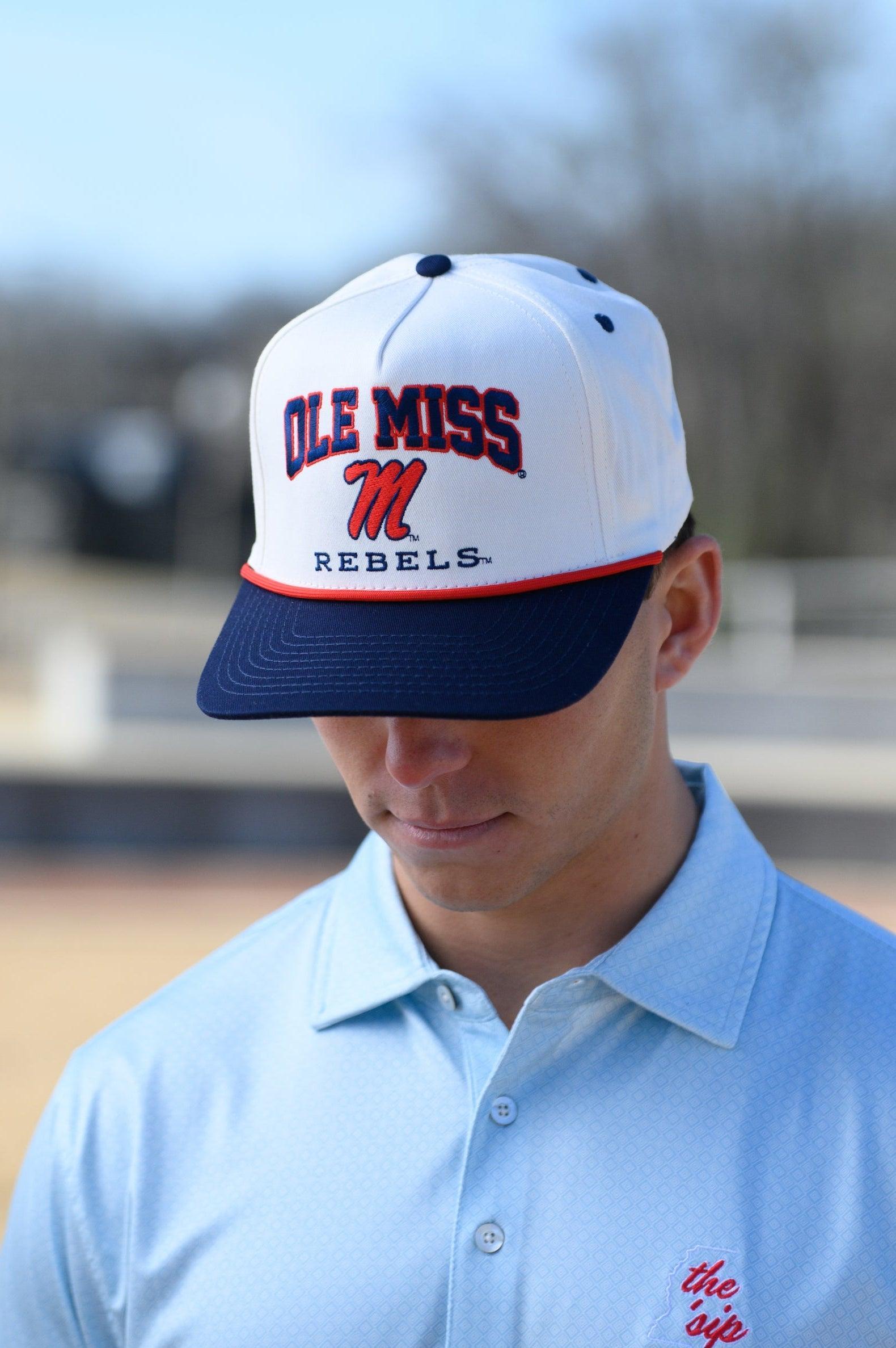 Ole Miss Cream and Navy Hat with embroidered text “Ole Miss Rebels” surrounding the Script M Logo