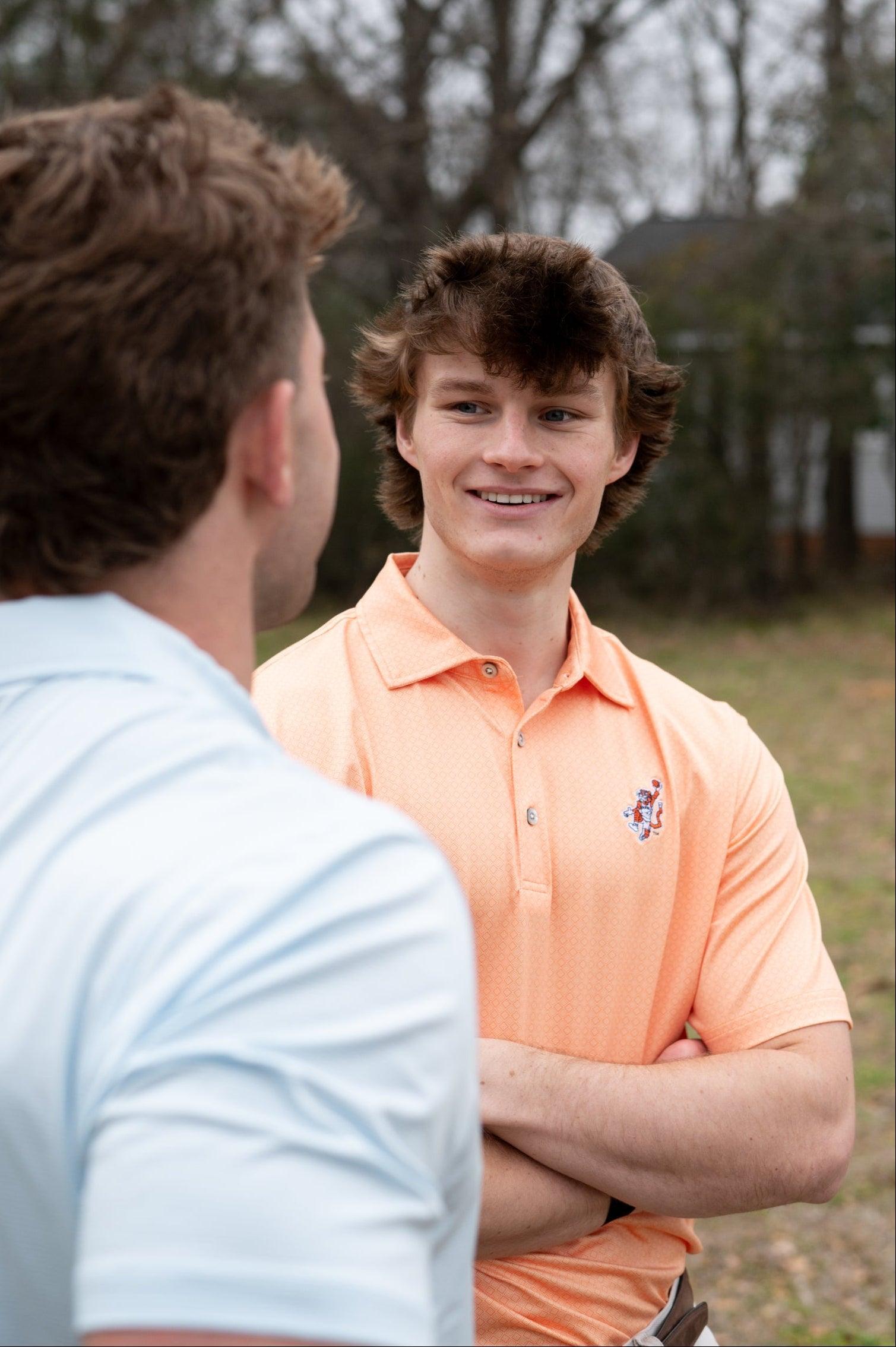 Auburn University Orange Men’s Diamond Polo with the Original Aubie Basketball Logo embroidery