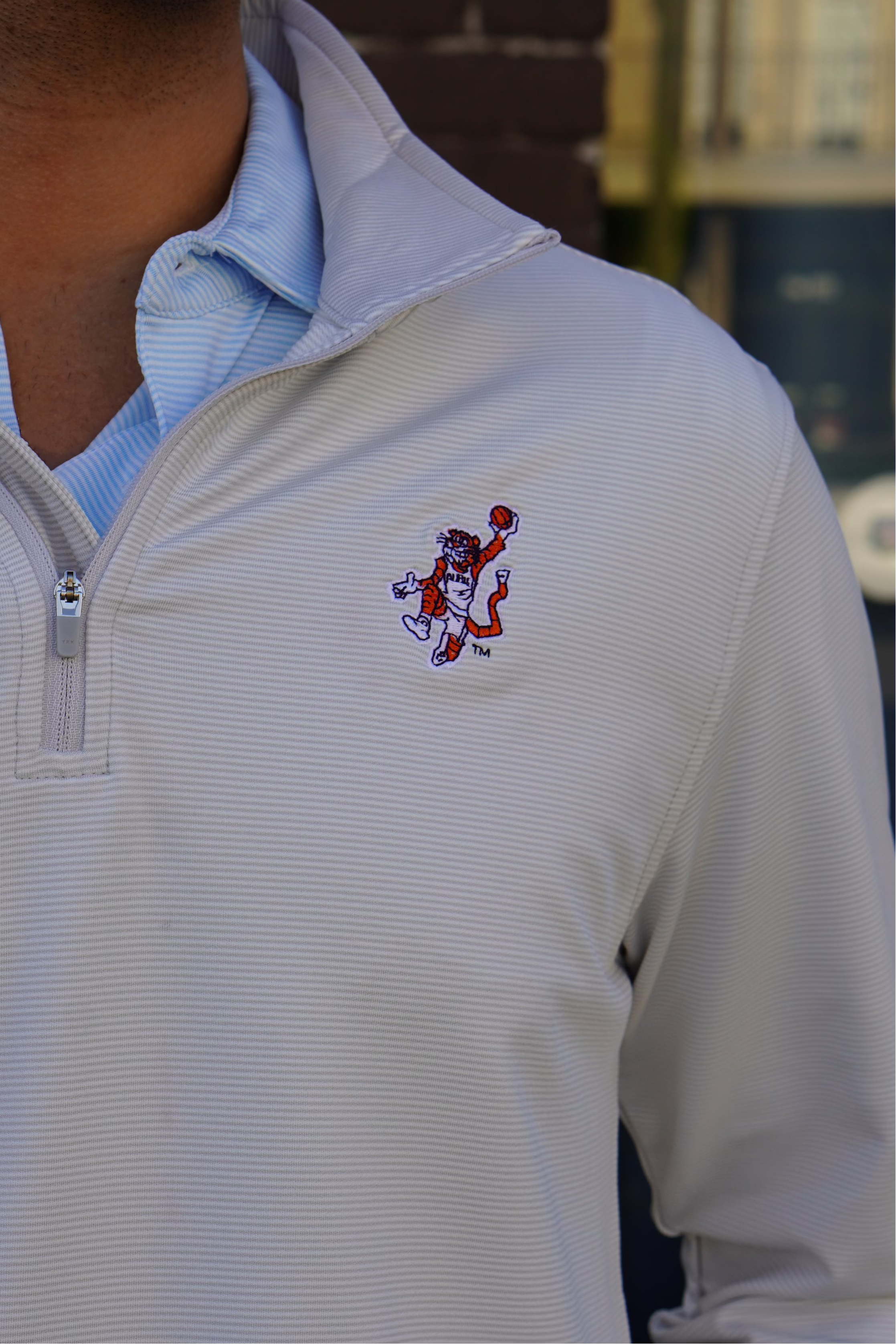 Auburn University Light Grey Stripe Men’s ¼ Zip Pullover with the Original Aubie basketball logo embroidery