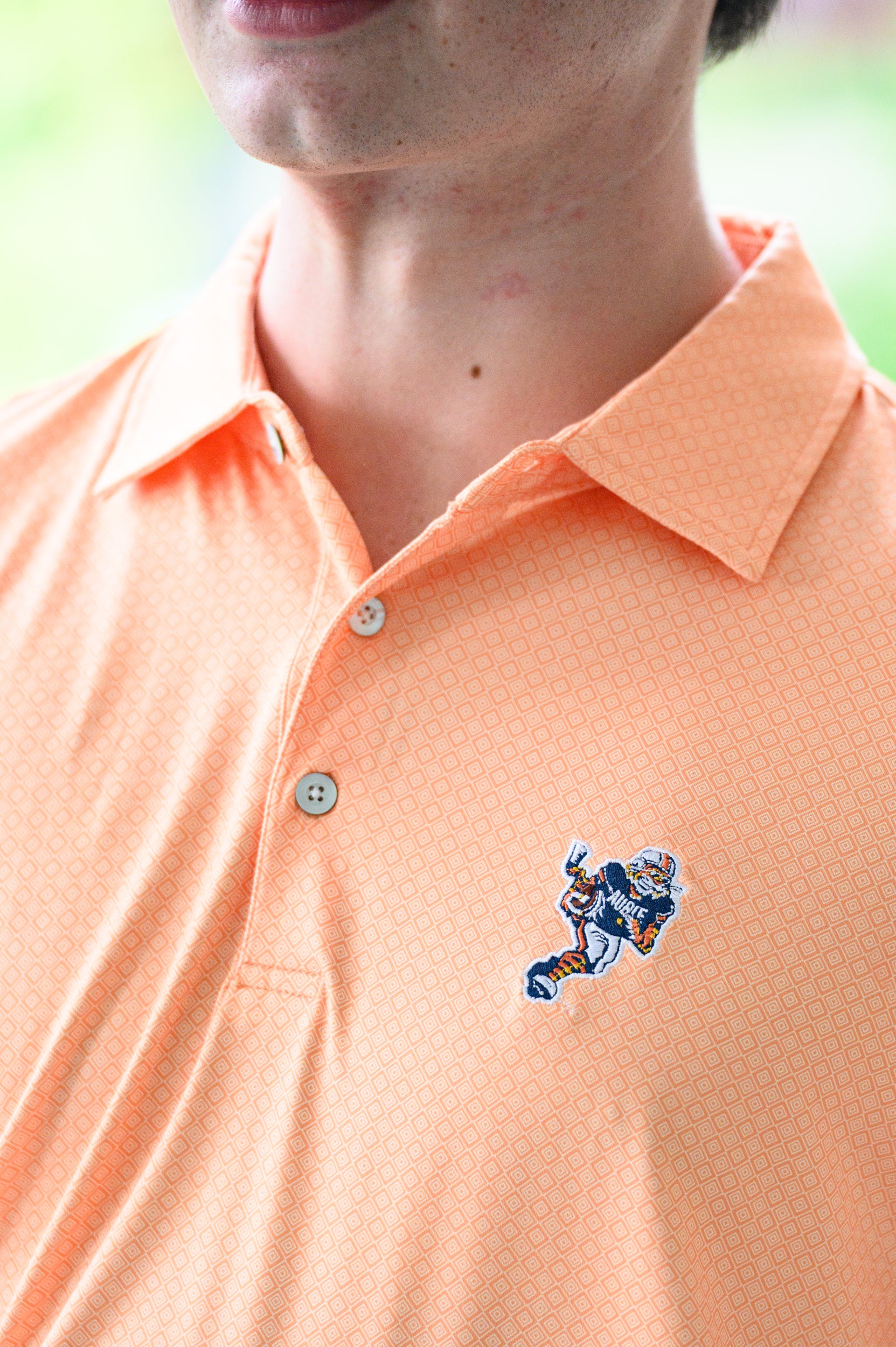 Auburn University Orange Men’s Diamond Polo with the Original Aubie Football Logo embroidery