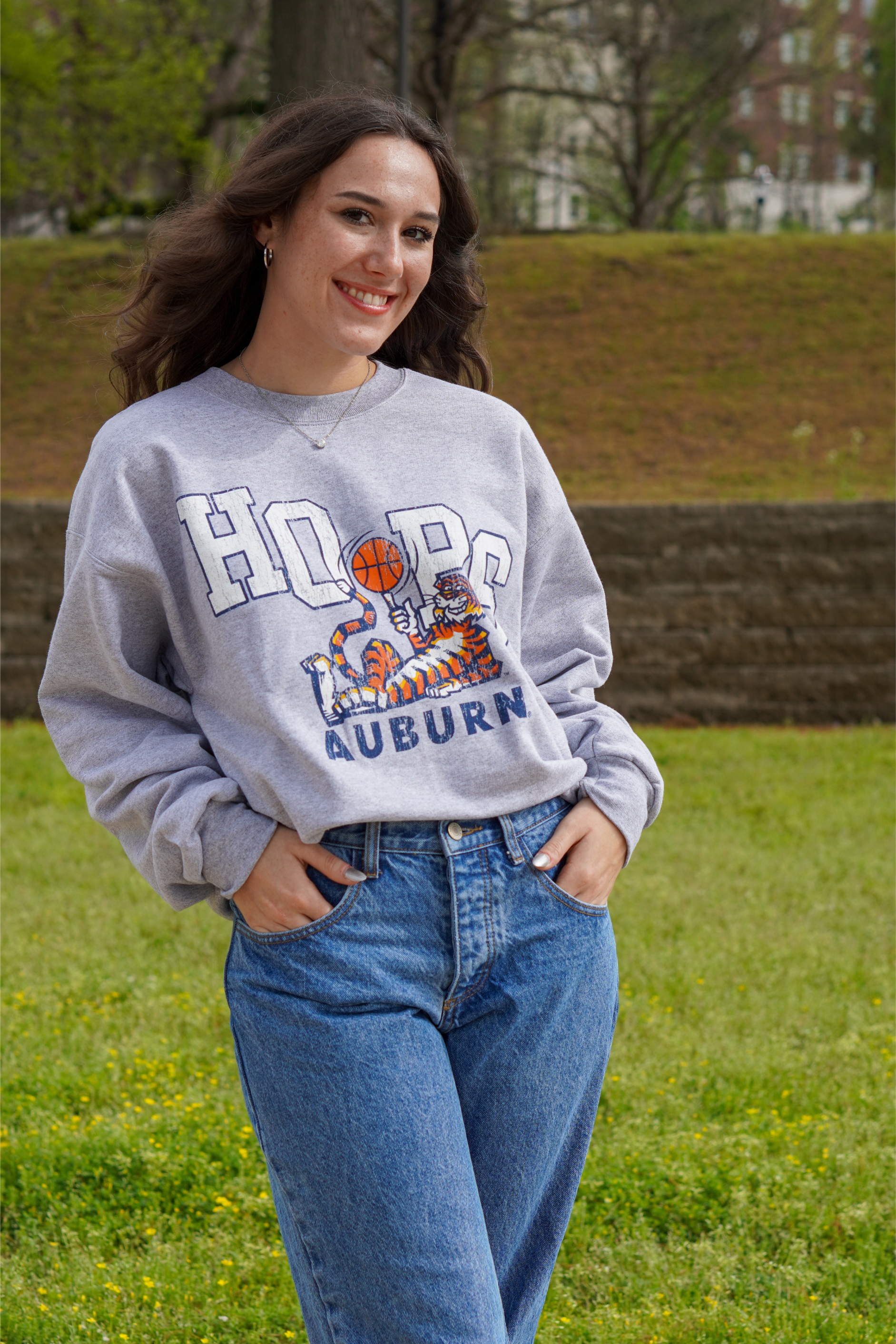 Auburn University Grey Sweatshirt with the Original Aubie lounging beneath the word "Hoops" and holding a basketball in place of the second "O"
