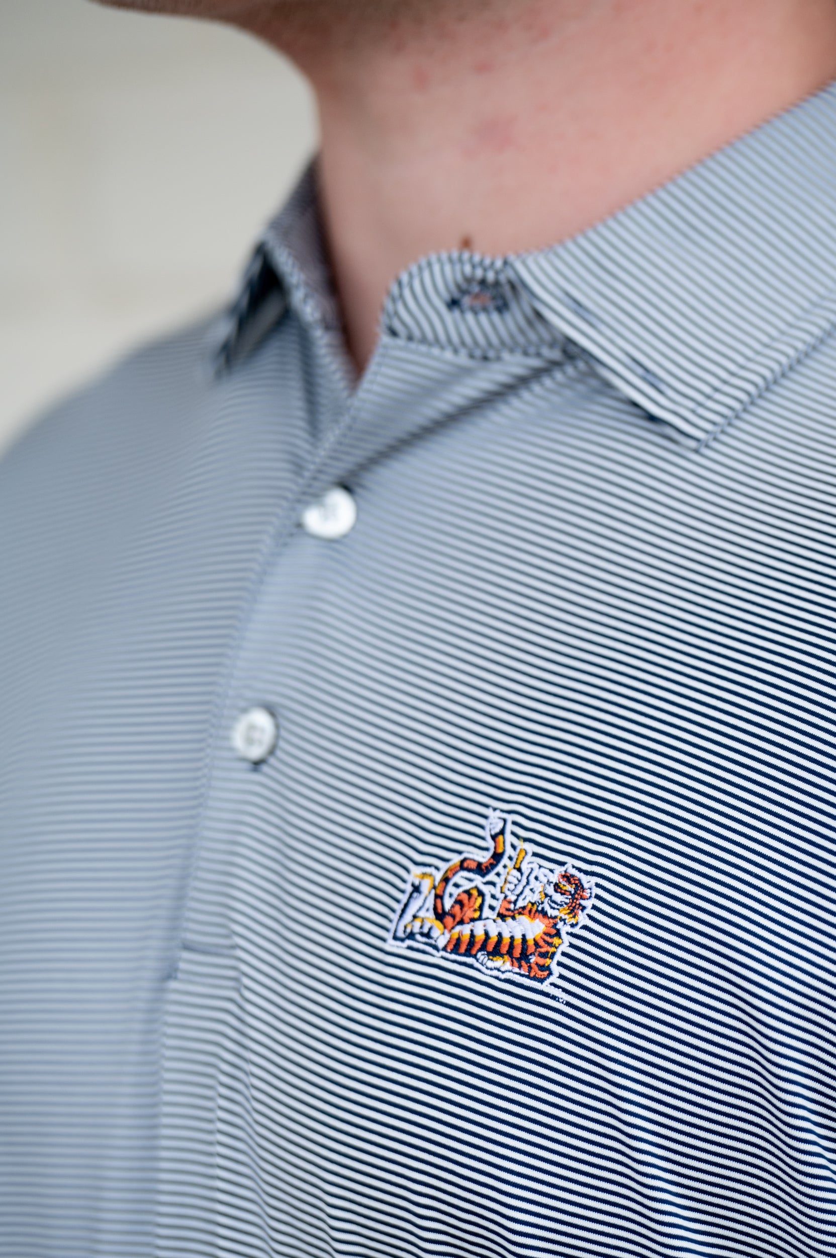 Auburn University Navy Men’s Stripe Polo with the Original Aubie Logo embroidery