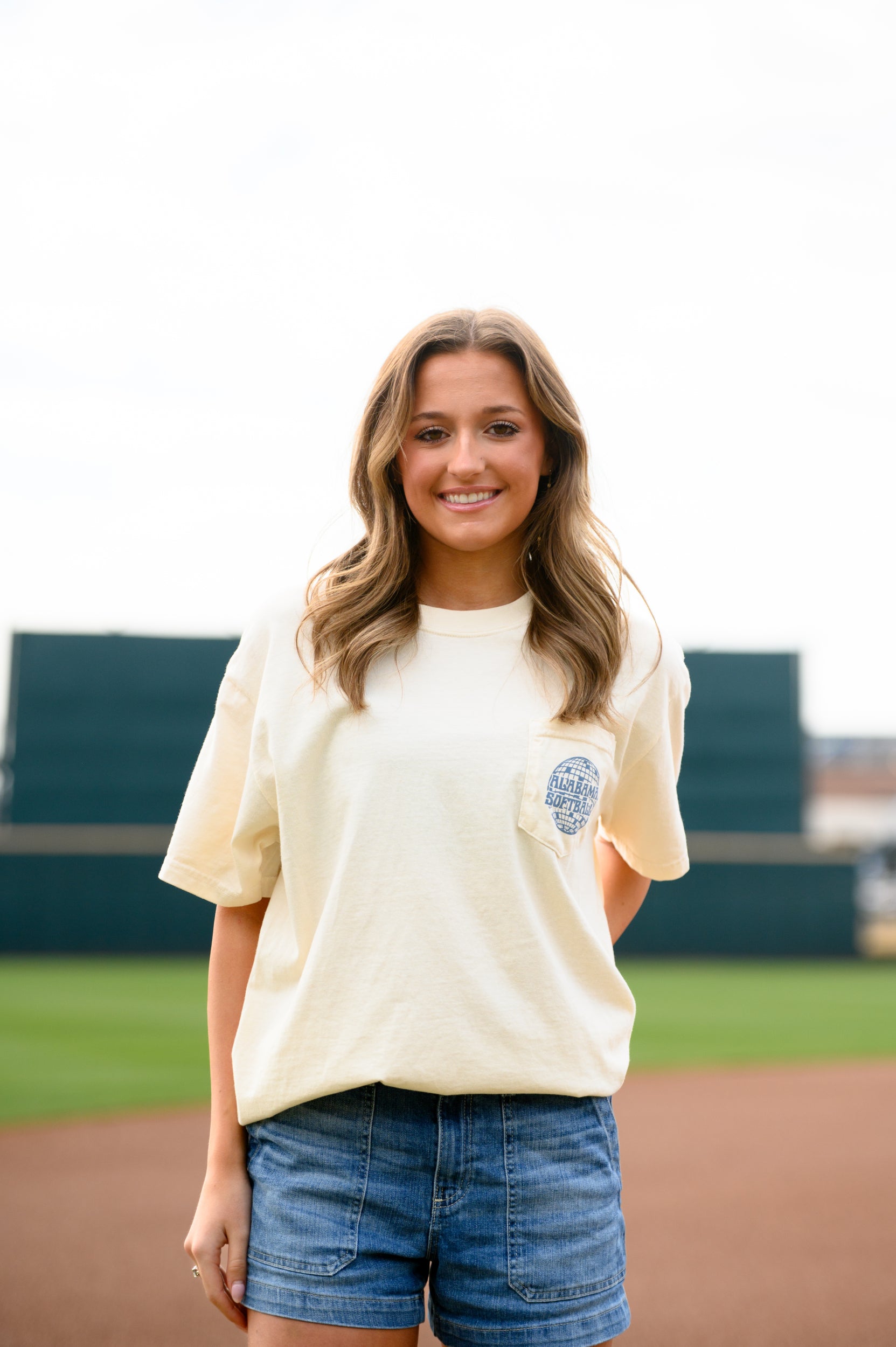 University of Alabama Ivory Front Pocket Design with a disco ball and text “Alabama Softball”