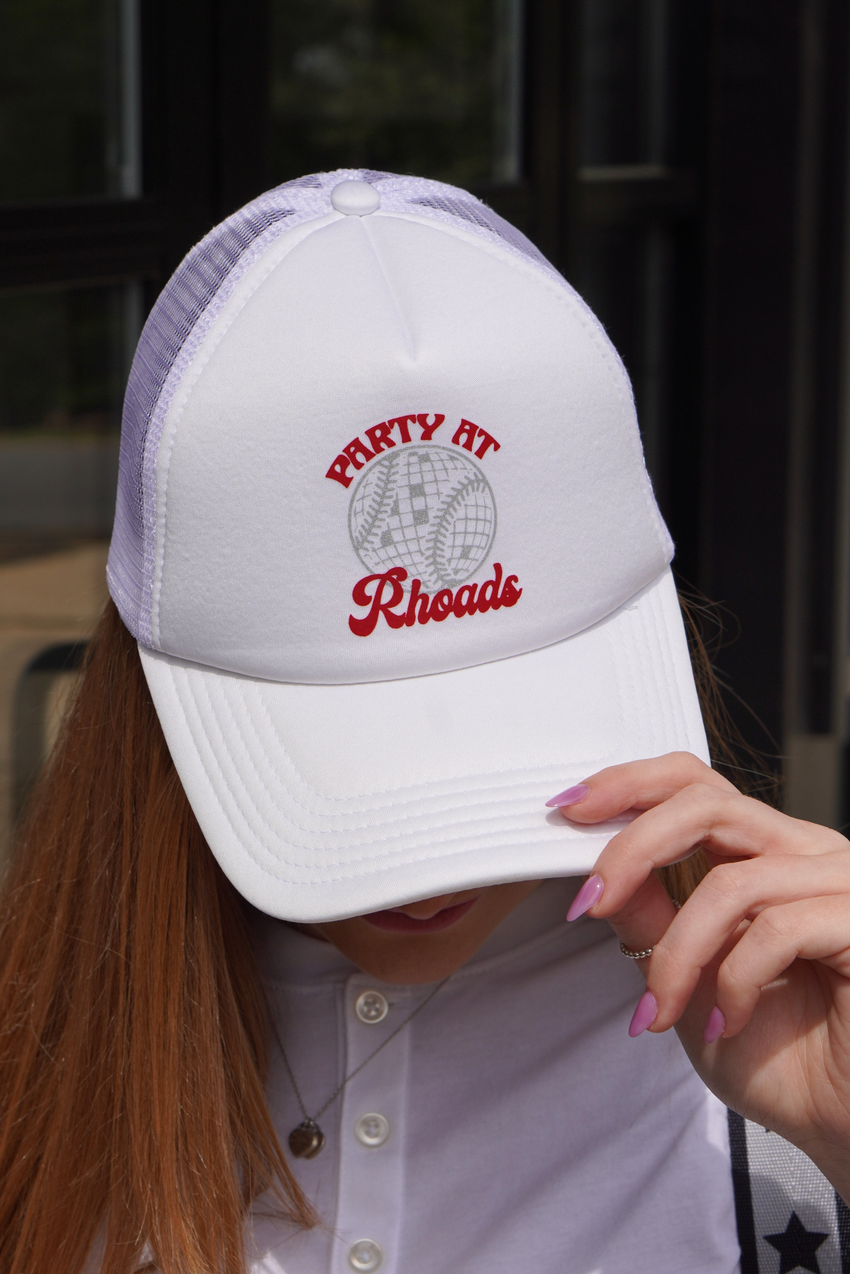 University of Alabama White Trucker Hat with 'Party At Rhoads' text and a disco softball design in silver and crimson.