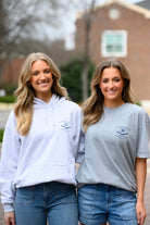 Two women wearing Plainsman Park Blueprint Products