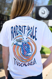 The Rabbit Hole White T-Shirt with an image of The White Rabbit serving a cocktail