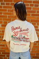Rama Jama’s Ivory T-Shirt with the Rama Jama’s Building under Red text “Rama Jama’s 30th anniversary” with “anniversary” inside a pennant flag