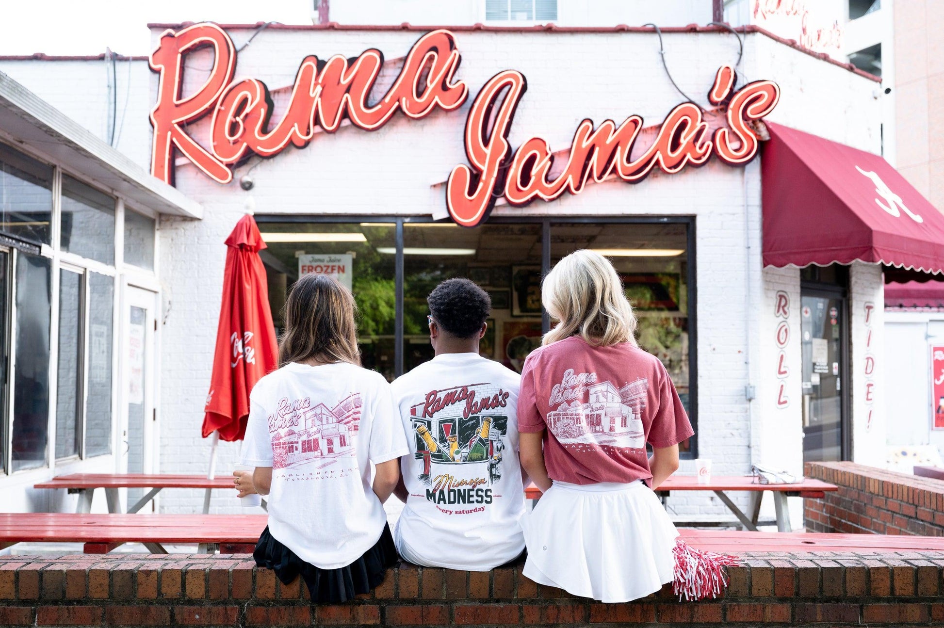 Rama Jama's White Tee with a Red illustration of the Rama Jama's Building 