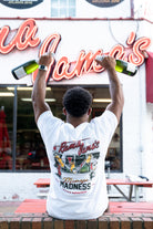 Rama Jama's White Mimosa Madness T-Shirt with an image of an ice bucket with three glass bottles inside and text "Mimosa Madness"