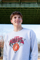 University of Alabama Light Grey Heather Sweatshirt with a Script A basketball underneath the words “Tide Hoops” 