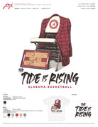 University of Alabama White T-shirt with a Script A brand folding chair that has a red flannel hanging over the back and a play planning board leaning against it. Below, Black text reading “The Tide is Rising”