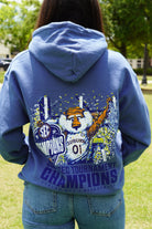 Auburn University Blue SEC Champions  Hoodie with an illustration of Aubie holding an "SEC Champions" sign while confetti pours down around him