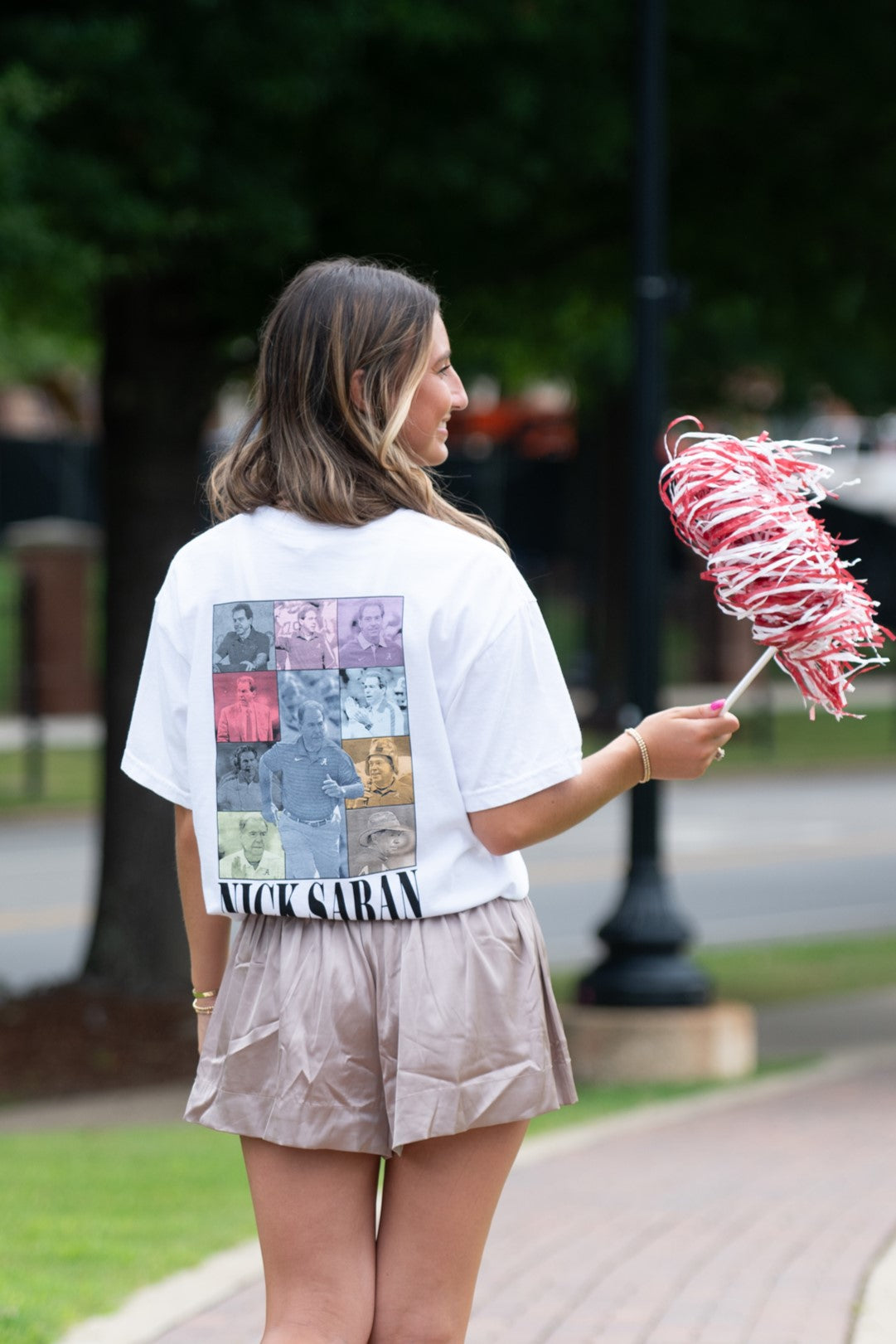 University of Alabama White Eras Tee with an Eras Tour inspired design featuring Nick Saban