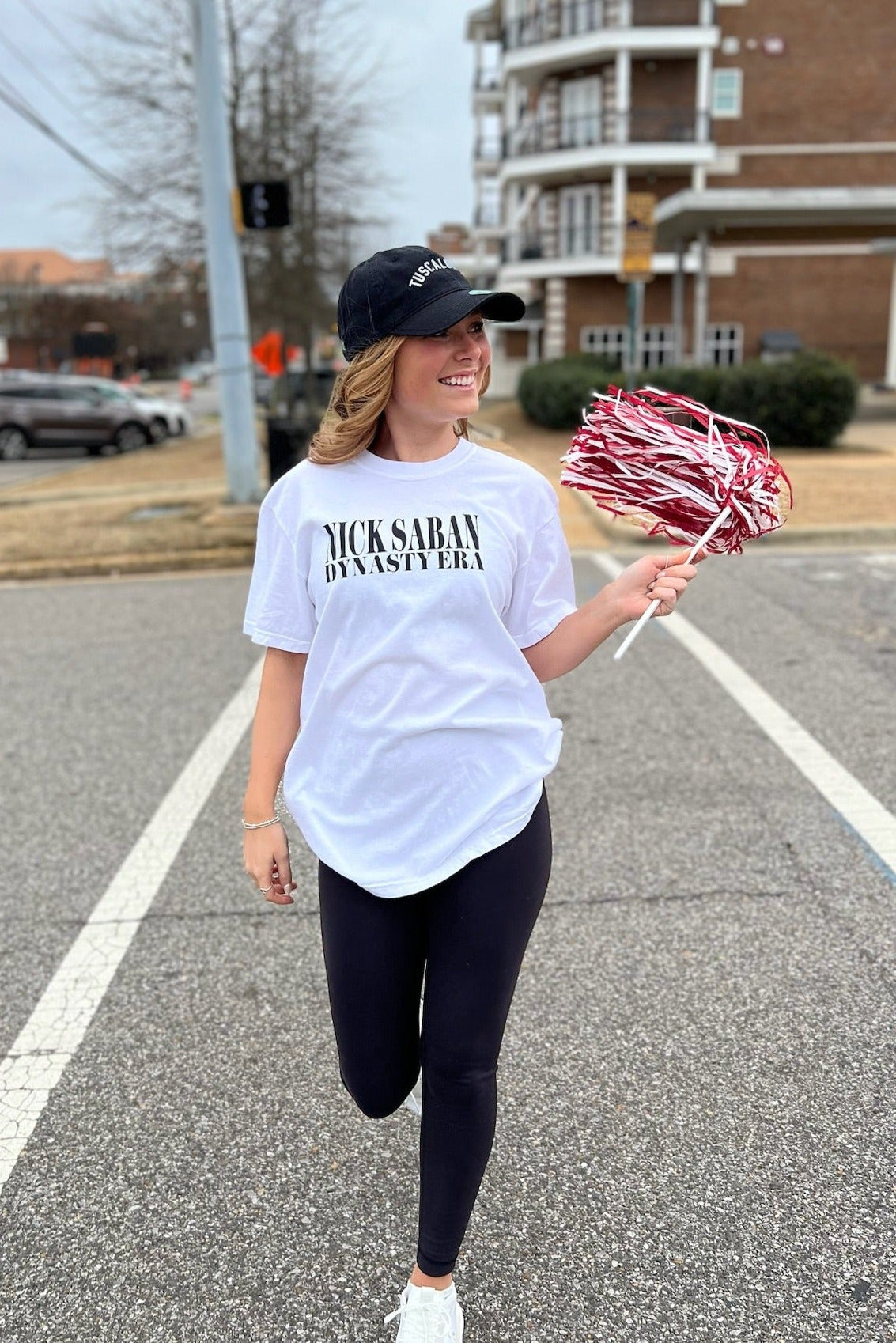 University of Alabama White Eras Tee with an Eras Tour inspired design featuring Nick Saban