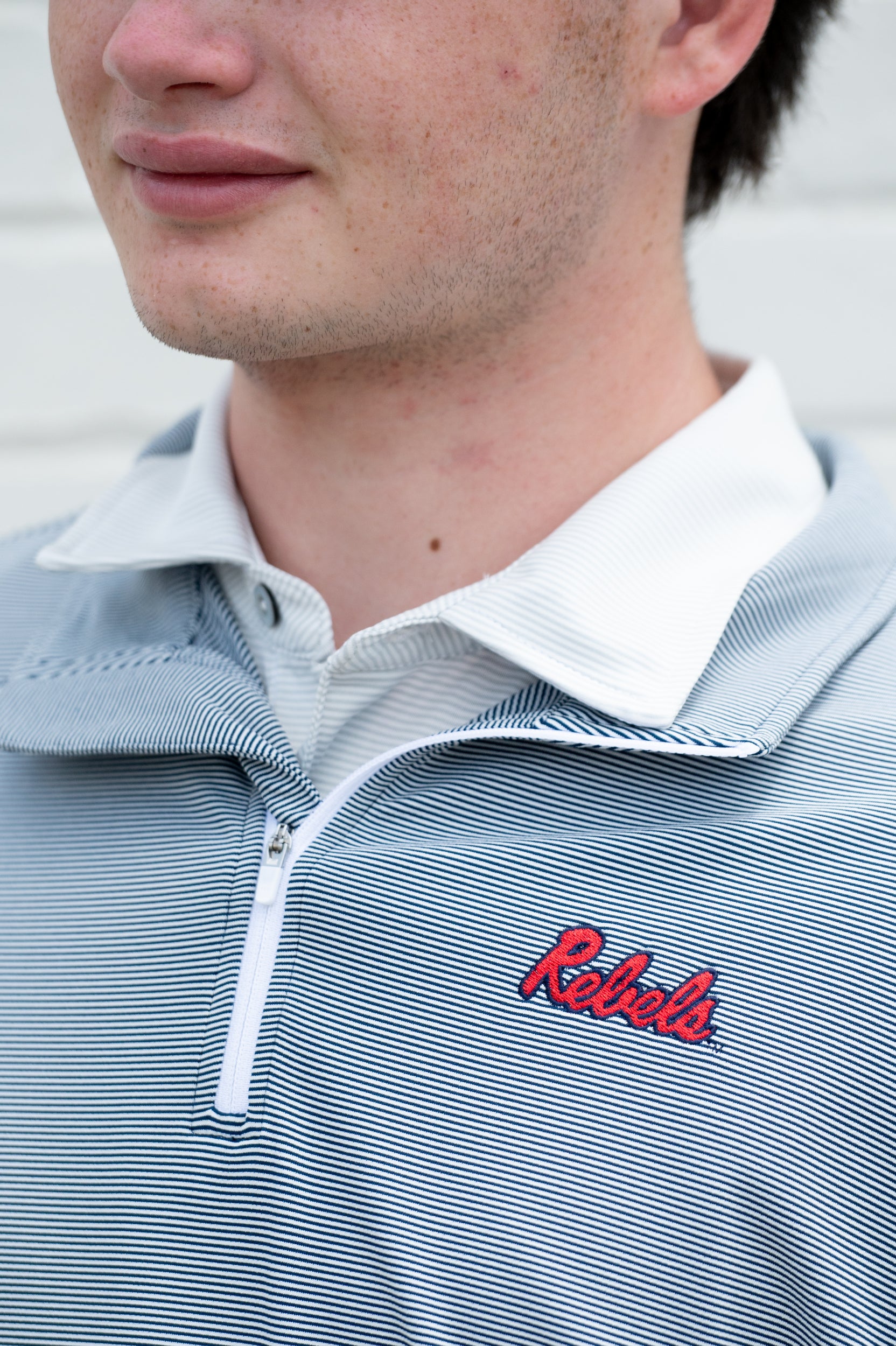 Ole Miss Navy Stripe ¼ Zip Pullover with the Script “Rebels” Logo embroidery