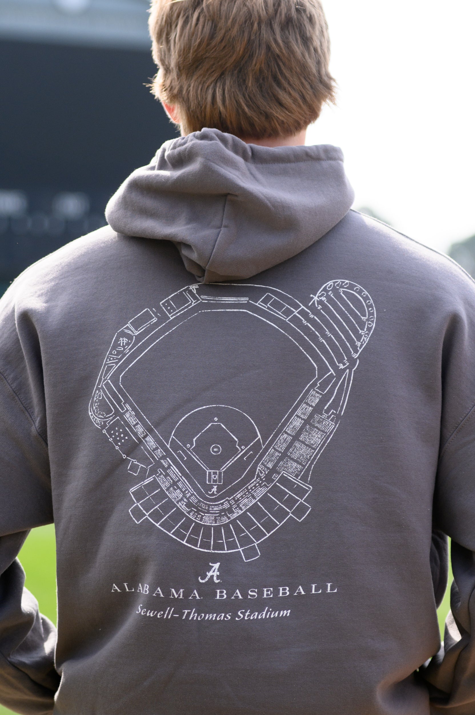 University of Alabama Dark Grey Distressed Hoodie with a White print of the Sewell-Thomas Stadium blueprint above text “Alabama Baseball”