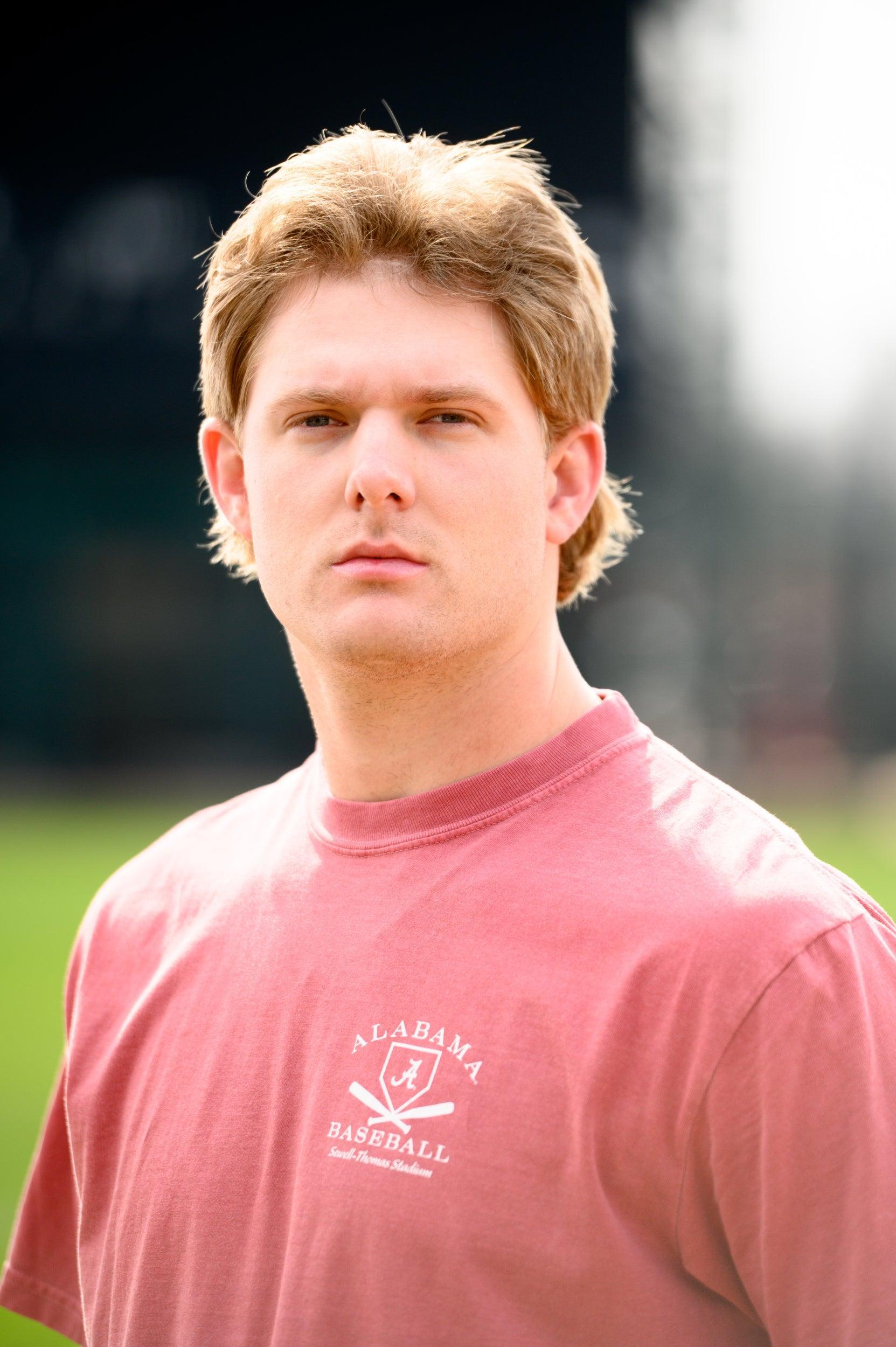 University of Alabama Red Distressed Tee Chest Design with a white print of home plate over two crossed baseball bats