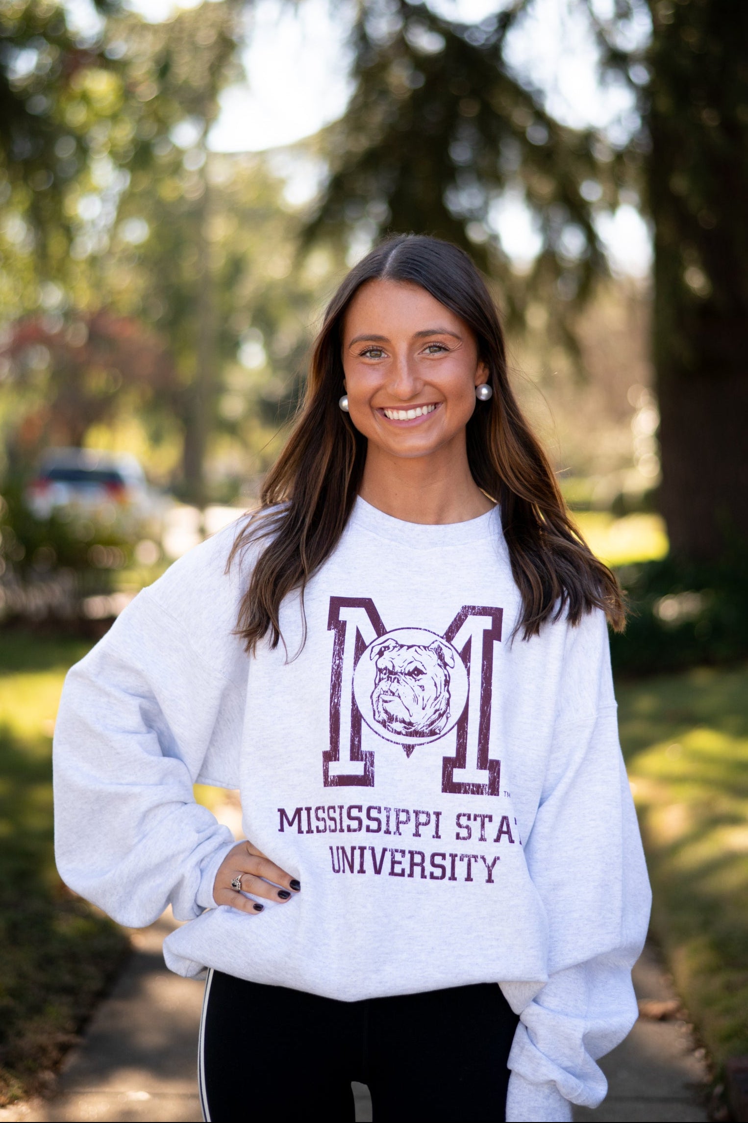 Mississippi State Light Grey Sweatshirt with the Vintage State Logo above Maroon text “Mississippi State University”