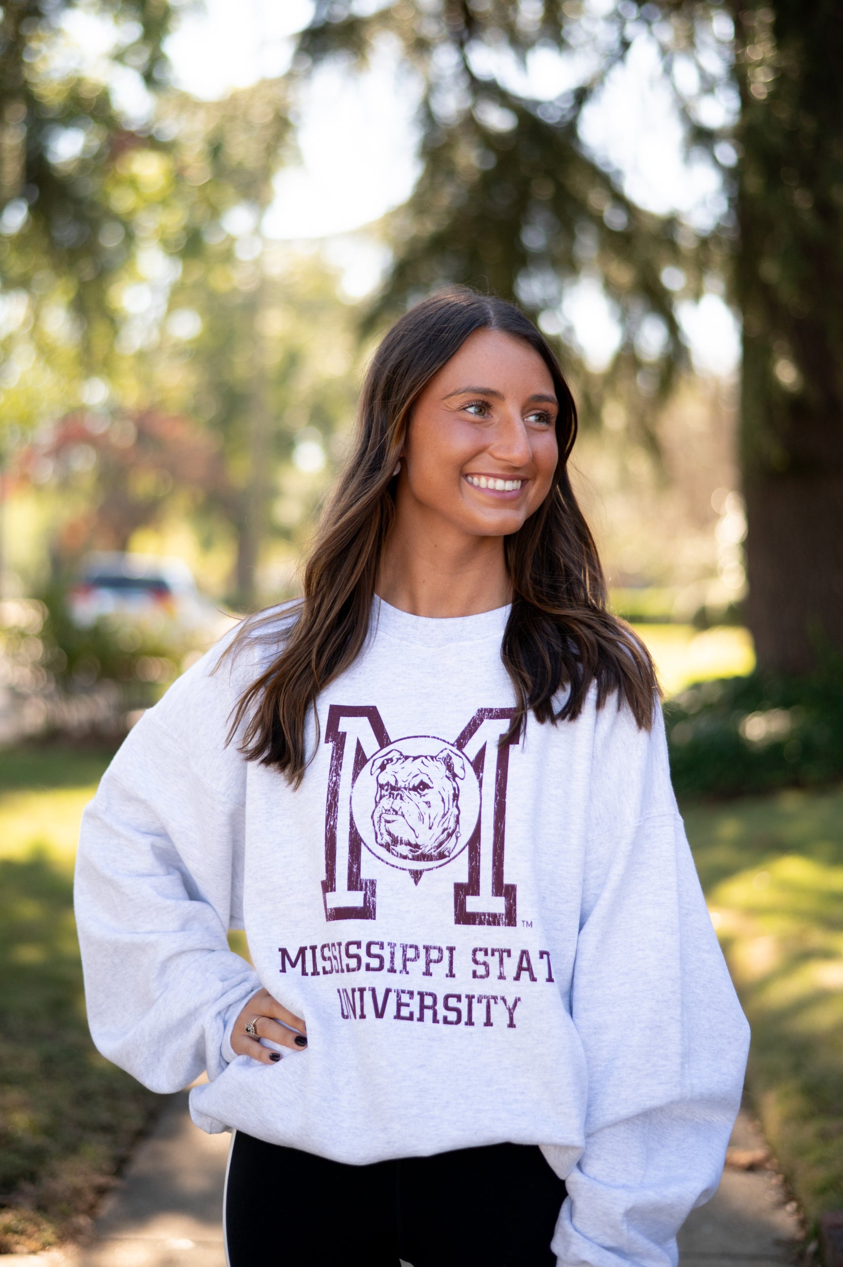 Mississippi State Light Grey Sweatshirt with the Vintage State Logo above Maroon text “Mississippi State University”