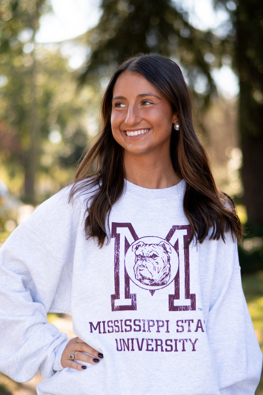Mississippi State Light Grey Sweatshirt with the Vintage State Logo above Maroon text “Mississippi State University”