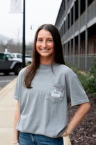 University of Alabama Grey T-Shirt  Pocket Design with White text “stir it up” over the Bryant-Denny Stadium