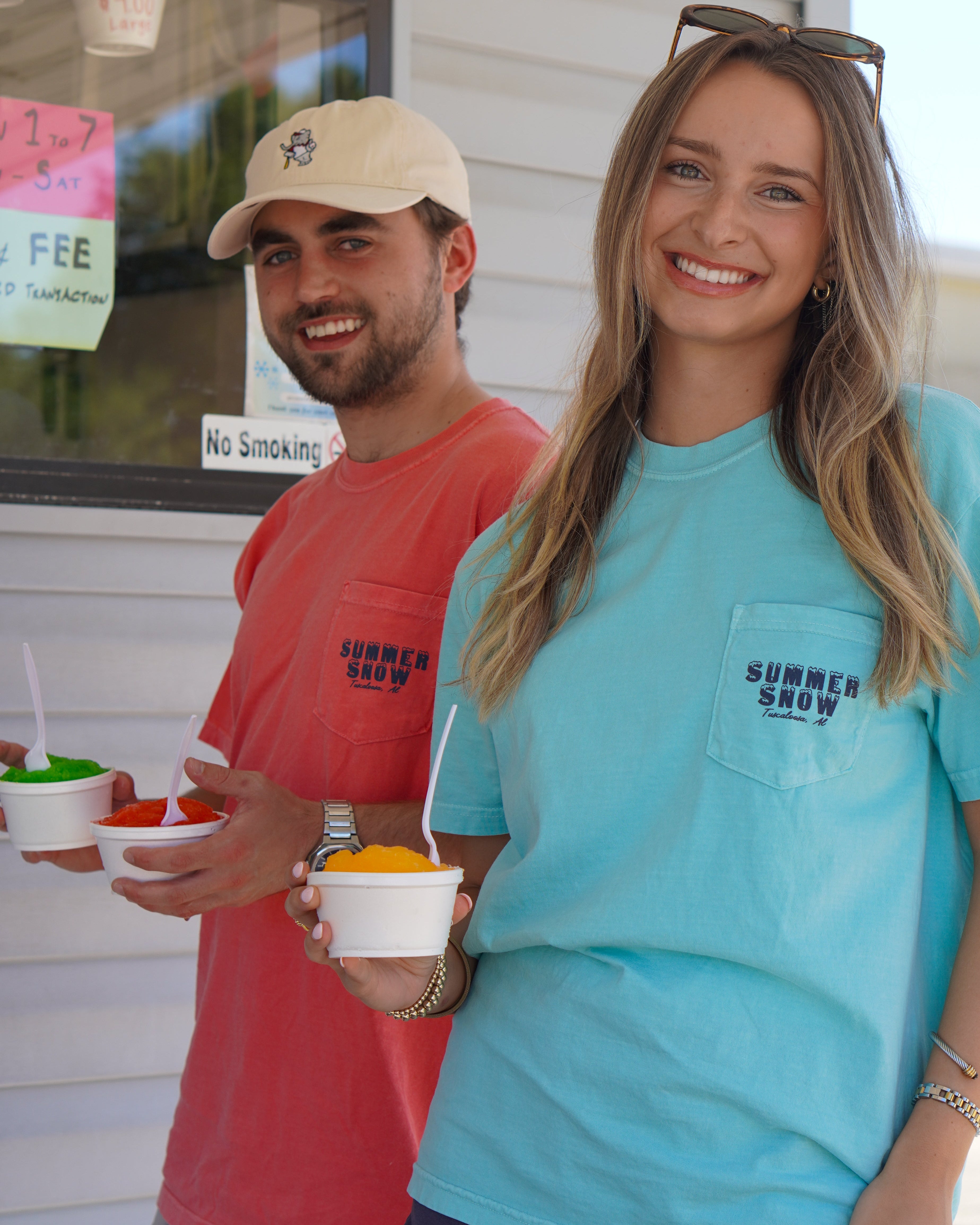 Summer Snow Chalky Mint and Watermelon T-Shirts with the Summer Snow logo above an image the Summer Snow building with two snow cones