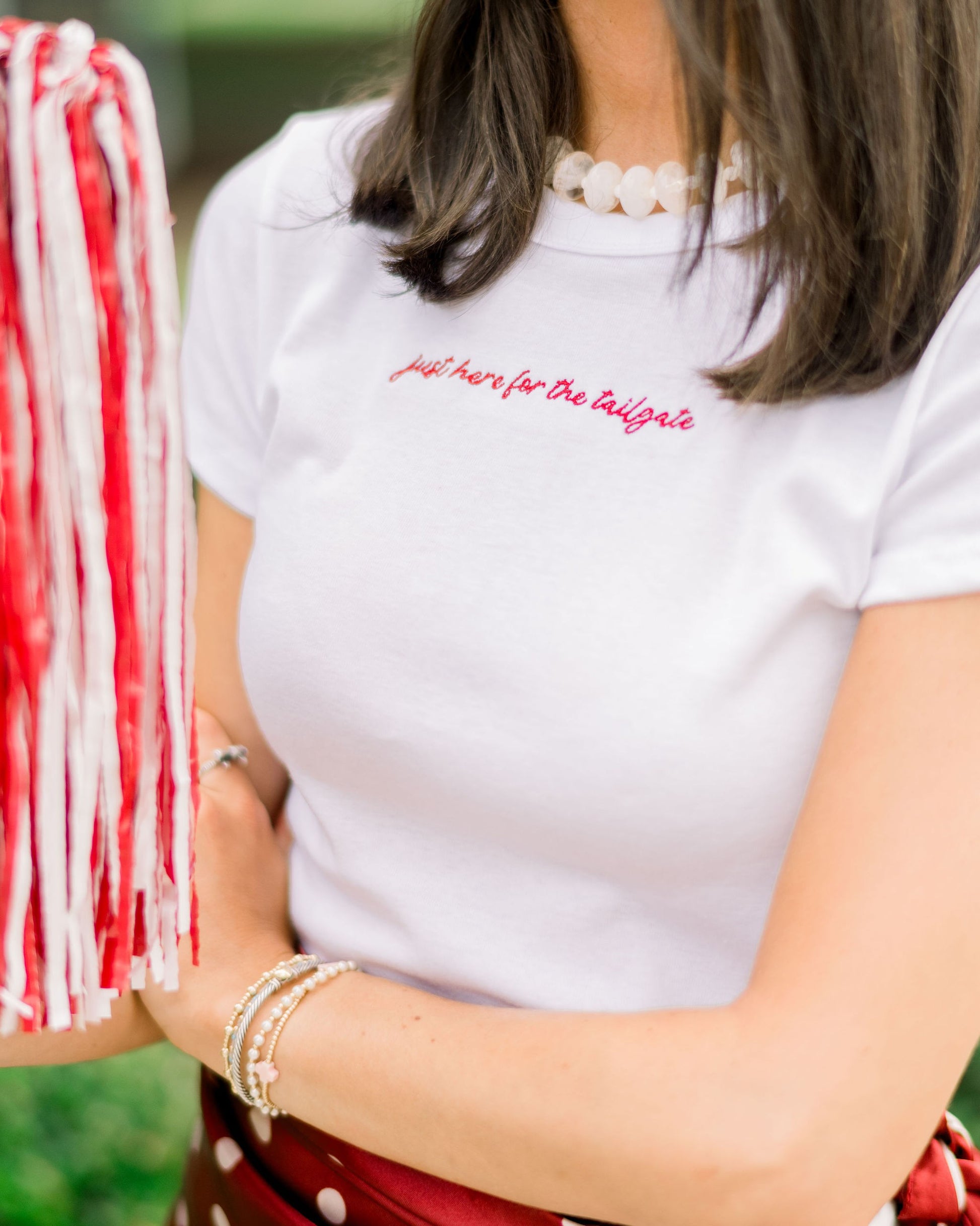 University of Alabama White Baby Tee with Red script “just here for the tailgate”