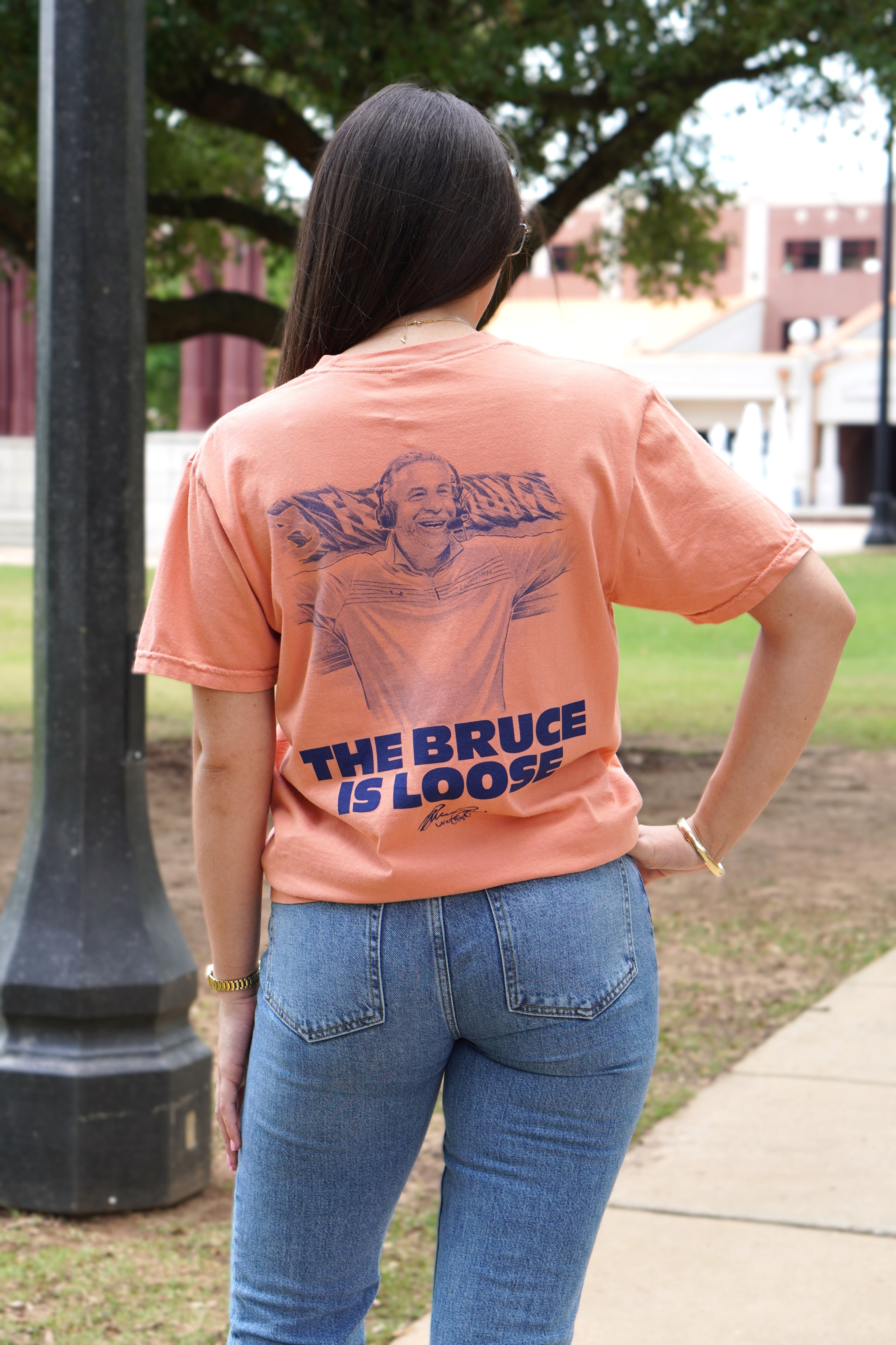 Auburn University Orange The Bruce is Loose T-Shirt featuring an illustration of the Auburn Basketball coach above text "The Bruce is Loose"
