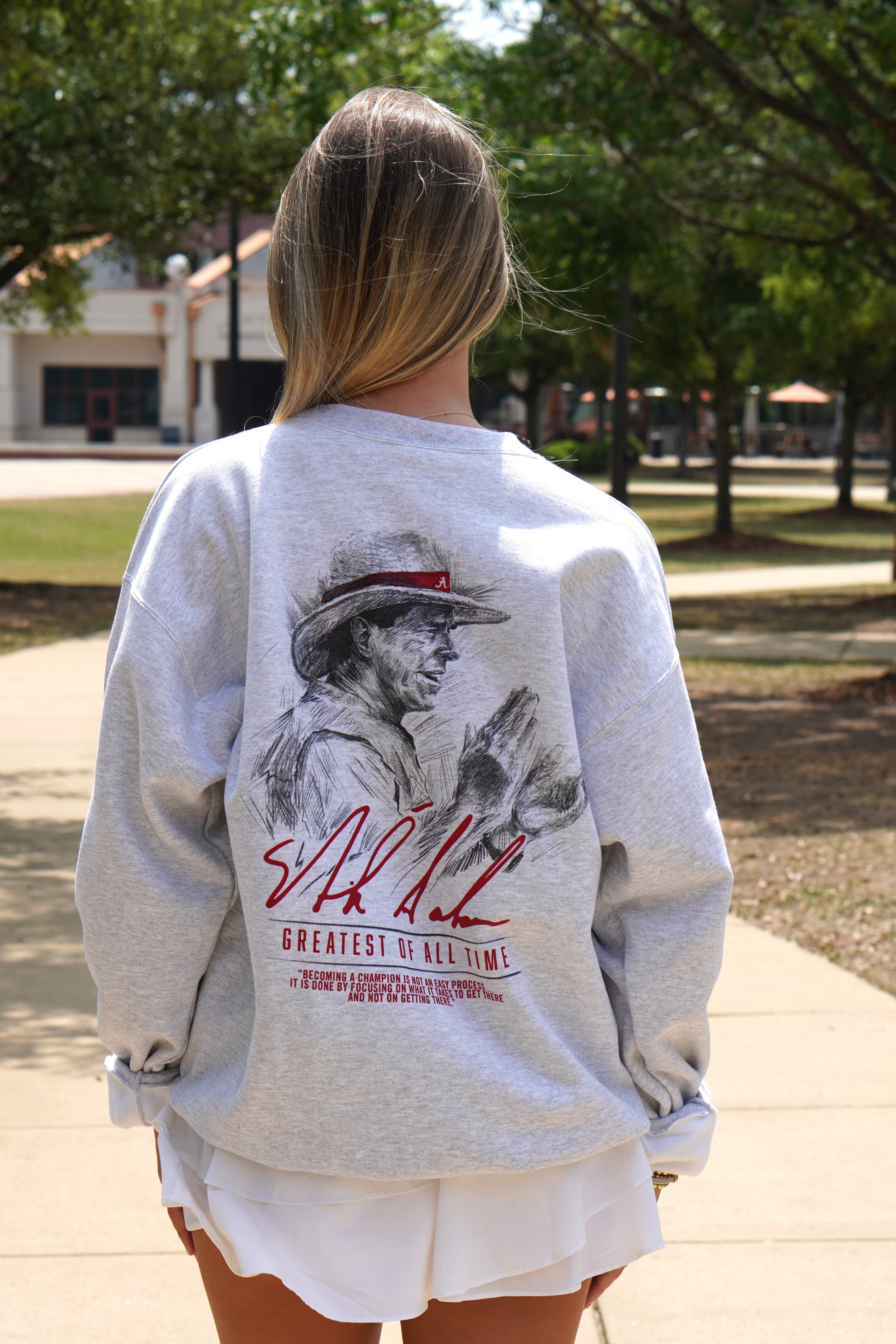 University of Alabama White Gildan Sweatshirt with an illustration of Nick Saban above his signature and Red text "Greatest Of All Time"