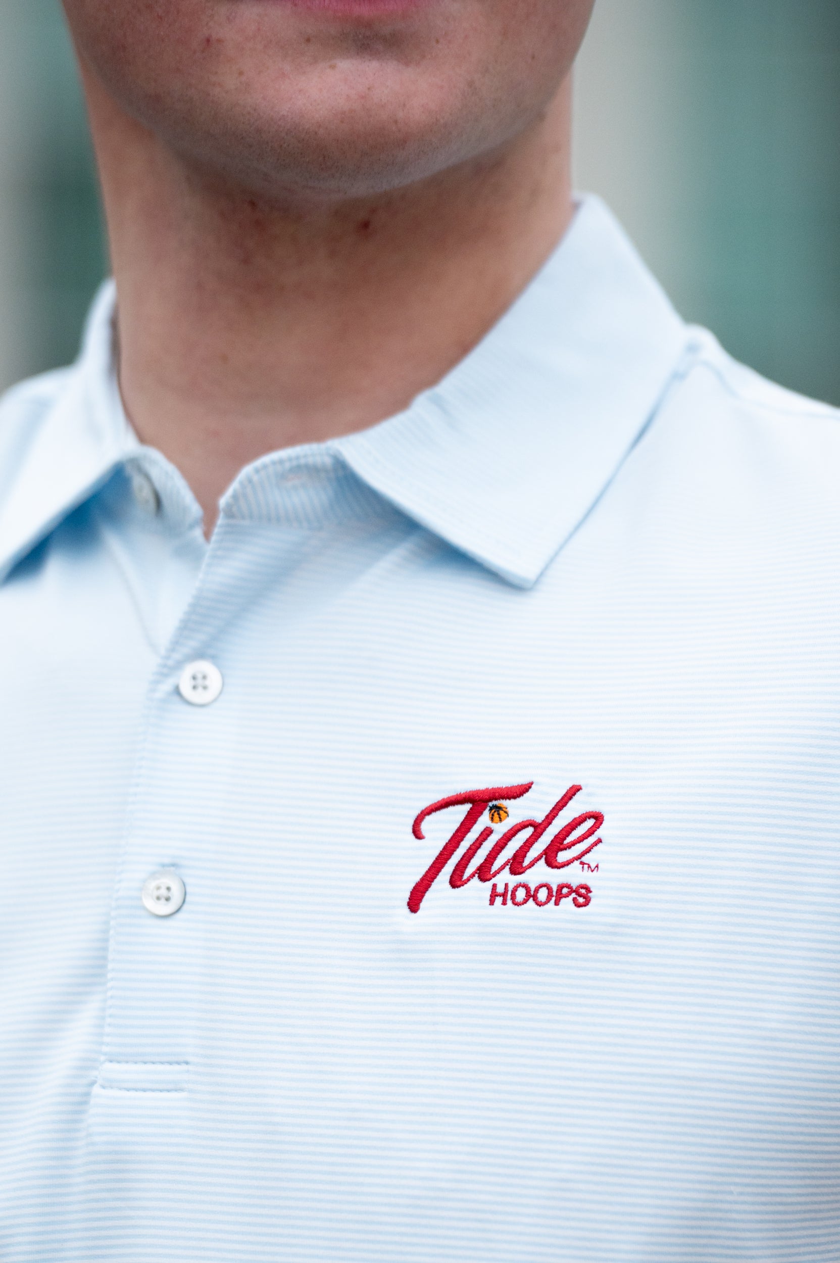 University of Alabama Men’s Light Blue Stripe Polo with the Tide Hoops Logo embroidered on the chest