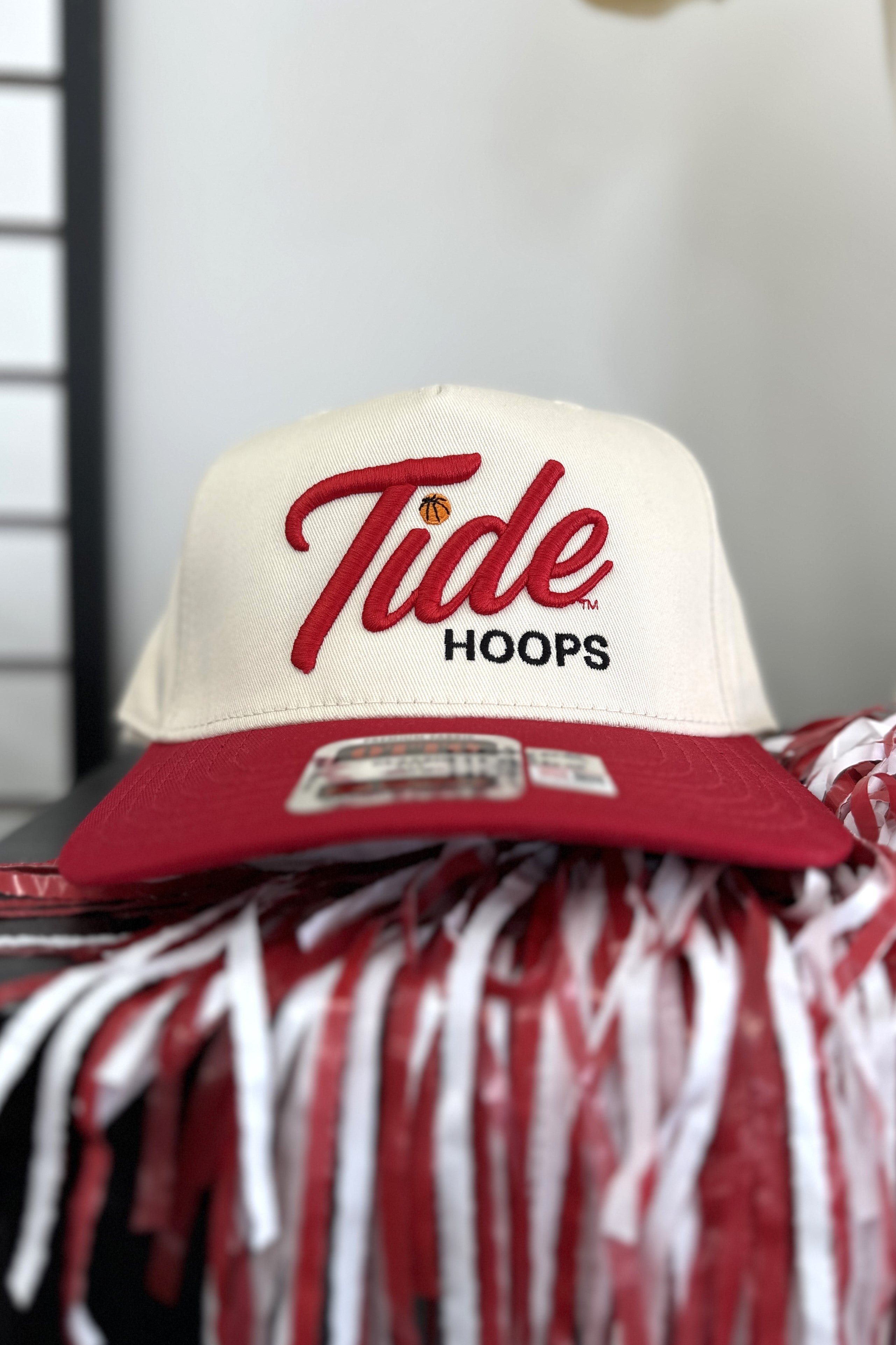 University of Alabama Cream and Red Hat featuring Red script "Tide" and Black "Hoops" embroidery