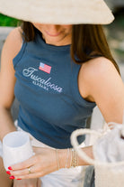 Local Merch Navy Tank Top with an embroidered American Flag above White embroidered text “Tuscaloosa Alabama”