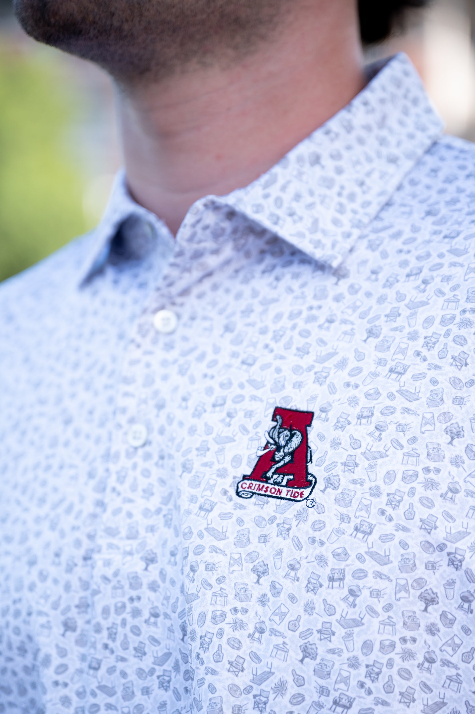 University of Alabama Grey UA Tailgate Men's Polo with a small Grey pattern of Drinks, Snacks, Grills, and Alabama states, etc. and Vintage A Logo Embroidery