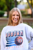 Auburn University Auburn Basketball Vintage White Gildan Sweatshirt with retro style Orange text "Auburn" and an image of a basketball with the AU Logo