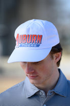 Auburn University White Hat with Orange text "Auburn" above a Blue Stripe with White text "Tigers"